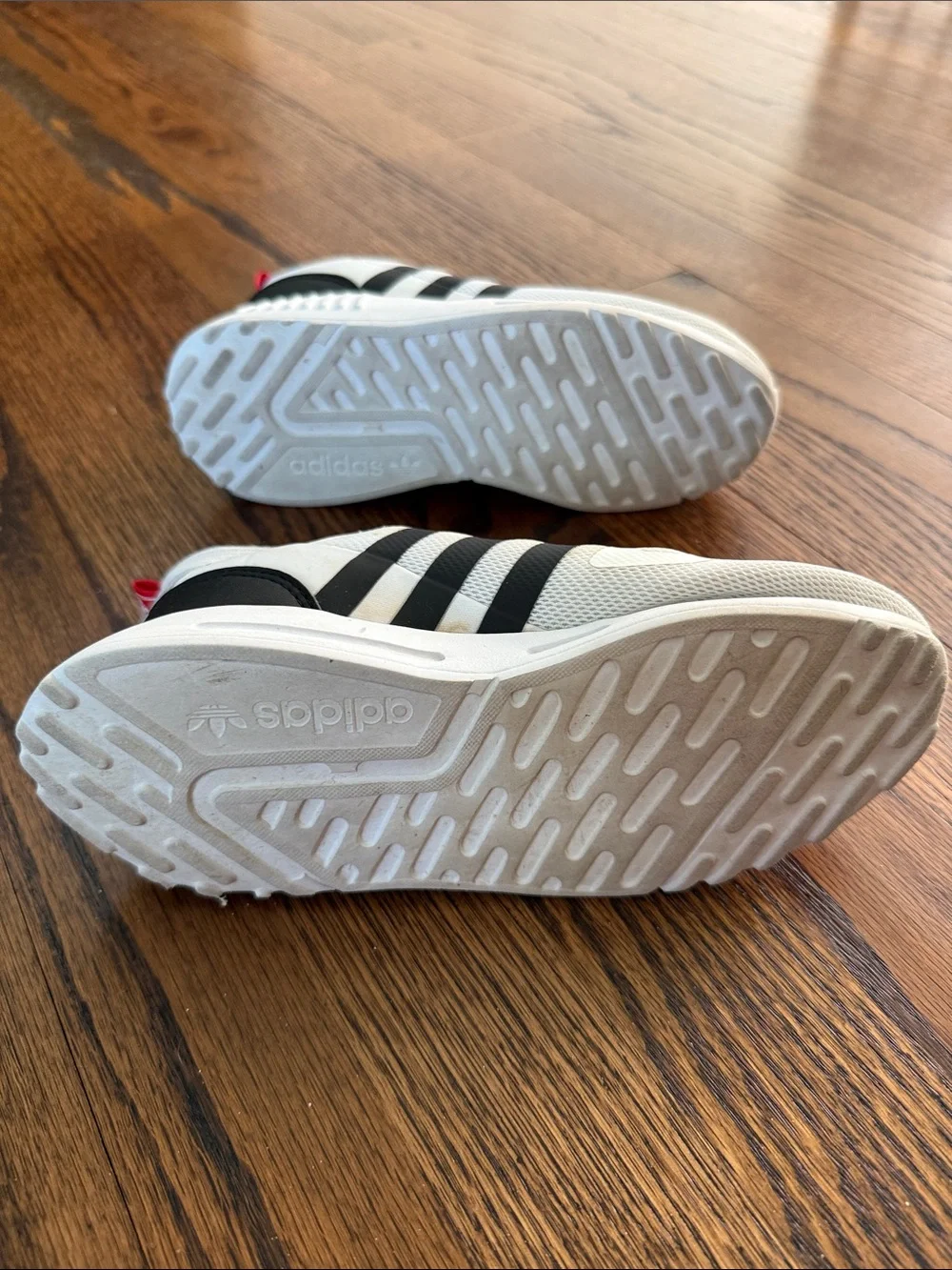 E adidas Kids 13.5 White Sneakers with Black Stripes and Red Heel Tabs
